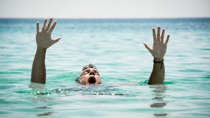 depositphotos_104586538-stock-photo-drowning-man-in-sea